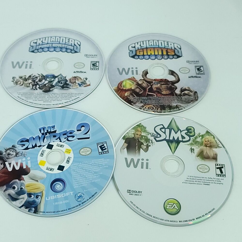 Nintendo Wii Games Lot of 4 Bundle Skylanders Spyro Smurfs 2 Sims 3